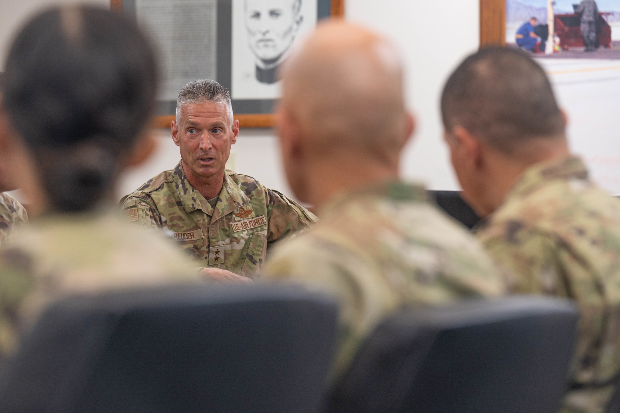 U.S. Air Force Maj. Gen. Gregory Kreuder, 19th Air Force commander, speaks to the leadership of the 56th Fighter Wing