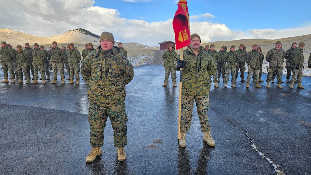 U.S. Marine Corps Capt. Avery Moore, outgoing commanding officer, Detachment D, 4th Law Enforcement Battalion, Force Headquarters Group, Marine Forces Reserve, holds a formation with Capt. Garrett Gundy, incoming commanding officer, for a change of command ceremony at Ft. Harrison, Helena, Montana, March 20, 2025. The change of command ceremony represents the official passing of authority from the outgoing commander to the incoming commander. (U.S. Marine Corps photo by courtesy of 4th Law Enforcement Battalion)