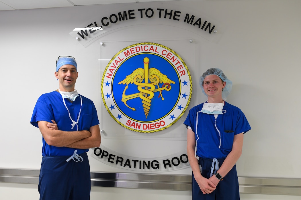SAN DIEGO (July 10, 2025) Andrew Nelles observed the care of oncology patients across the multidisciplinary spectrum within the new Cancer Program at Naval Medical Center San Diego’s Cancer Oncology Center of Excellence, and worked alongside Commander Vicente, both in clinic and the operating room. Naval Health Research Center, part of Navy Medicine Research & Development, supports Navy, Marine Corps, and joint U.S. warfighter health readiness and lethality with research and development that delivers high-value, high-impact solutions to the health and readiness challenges U.S. military population faces on the battlefield, at-sea, home and abroad. (U.S. Navy photo by Marcelo Calero)
