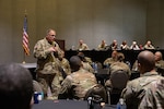 Chief Warrant Officer 5 Brian Searcy, the Command Chief Warrant Officer of the Army National Guard, addresses attendees of a warrant officer caucus session during the National Guard Association of the United States (NGAUS) conference in Milwaukee, August 24, 2025. The 147th NGAUS General Conference and Exhibition – which is held annually to connect delegates from all 54 states and territories to discuss the future of the National Guard – took place August 21-25 and featured various events and social gatherings throughout Milwaukee to showcase Wisconsin’s rich history and heritage.