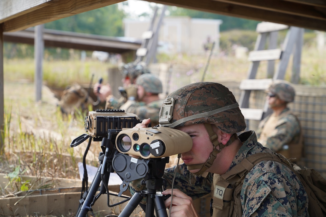 U.S. Marine Corps Lance Cpl. Christian Lewis, a fire support Marine with 6th Air Naval Gunfire Liaison Company, Force Headquarters Group, Marine Corps Forces Reserve, utilizes a Common Laser Range Finder-Integrated Capability to acquire target information during exercise Northern Strike 25-2 at Camp Grayling, Michigan, Aug. 4, 2025. Marines at NS 25-2 continue to enhance joint force lethality by coordinating and controlling CAS missions in complex, multinational environments. (U.S. Marine Corps photo by Master Sgt. Latasha Esperon)