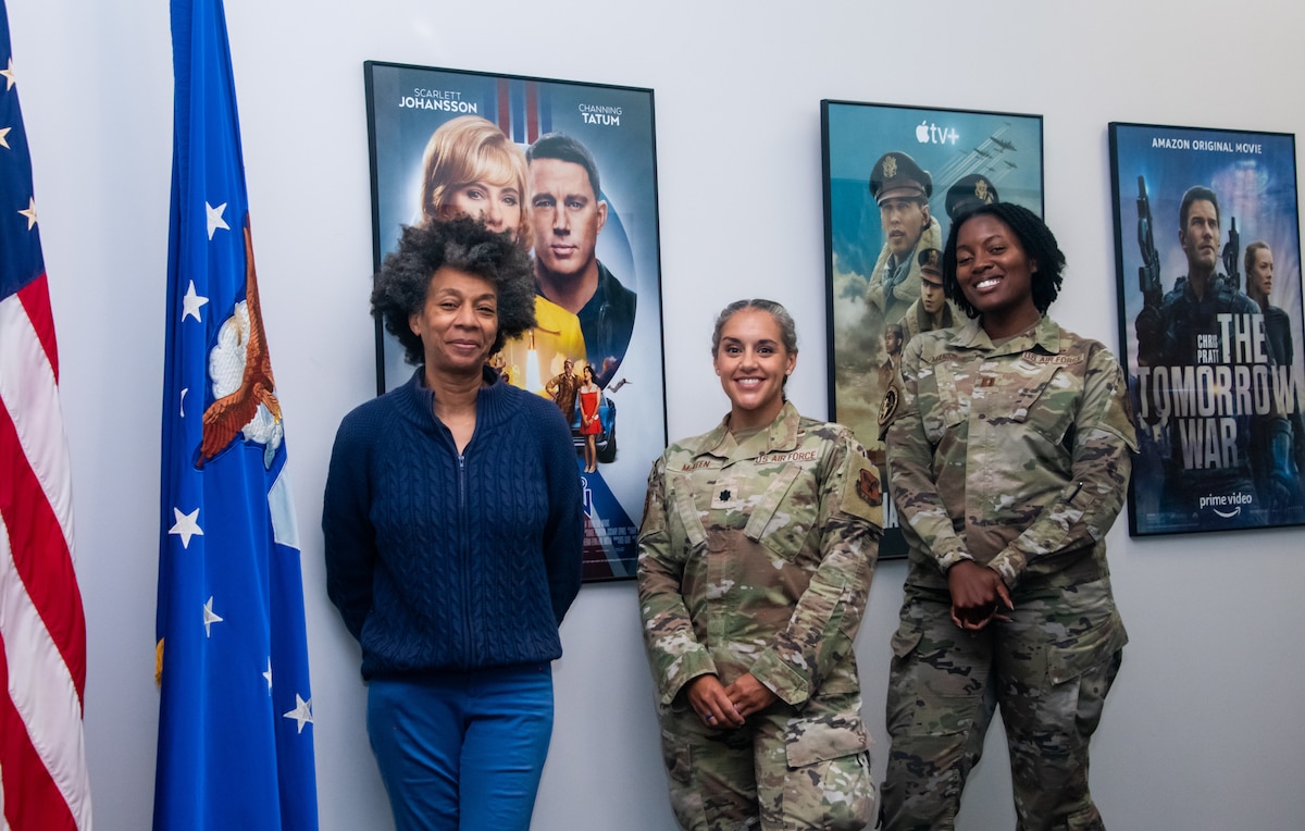 (left to right) Ms. Develyn Watson, deputy director, Department of the Air Force Entertainment Liaison Office (AFELO); Lt. Col. Gina “Flash” McKeen, director, AFELO, and Capt. Jasmine Manning, AFELO project officer, pose in their office, Aug. 13, 2025, at Los Angeles Air Force Base in California.  The Department of the Air Force Entertainment Liaison Office, known as AFELO, is part of the Secretary of the Air Force Public Affairs Community Engagement Division, SAF/PAY. They are a tenant unit at Los Angeles Air Force Base and serve as the official liaison between the Department of the Air Force and the entertainment industry. Not pictured but also on the AFELO team are MSgt. Regina Smoke, superintendent, and Ms. Sara Francis, project officer. (Photo Credit: Van Ha, U.S. Space Force)