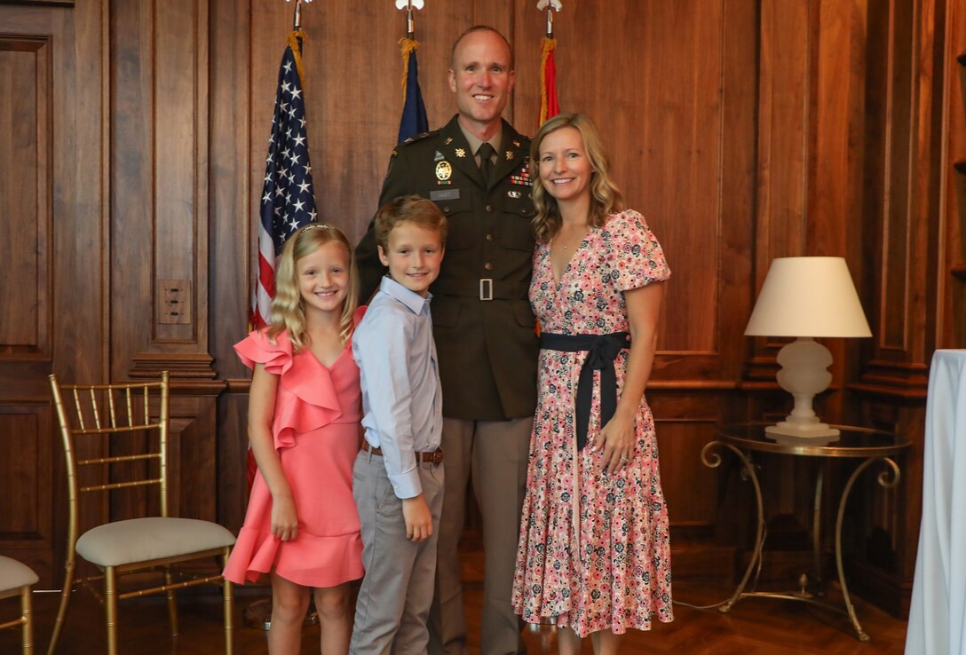 U.S. Army Col. Derek Hart poses with his wife, Emily; son, James; and daughter, Helen after his promotion ceremony at the Louisville Country Club in Louisville, Kentucky, Aug. 20, 2025.