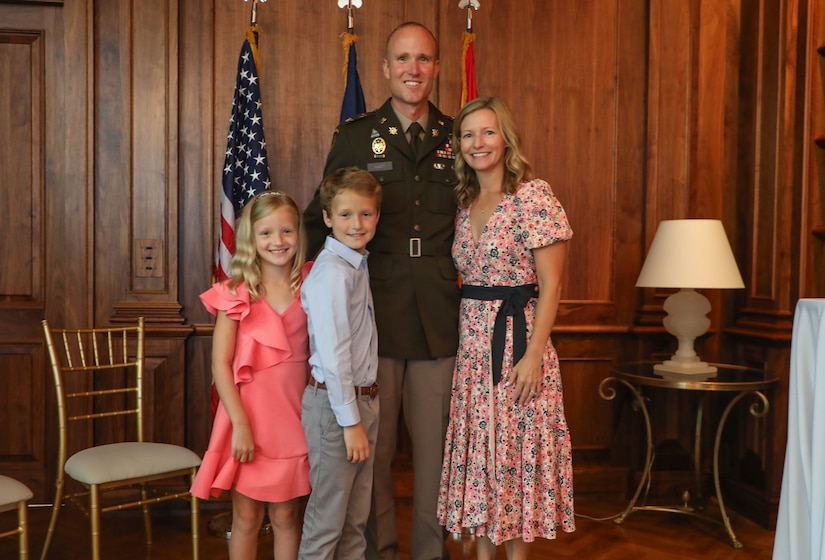 U.S. Army Col. Derek Hart poses with his wife, Emily; son, James; and daughter, Helen after his promotion ceremony at the Louisville Country Club in Louisville, Kentucky, Aug. 20, 2025.