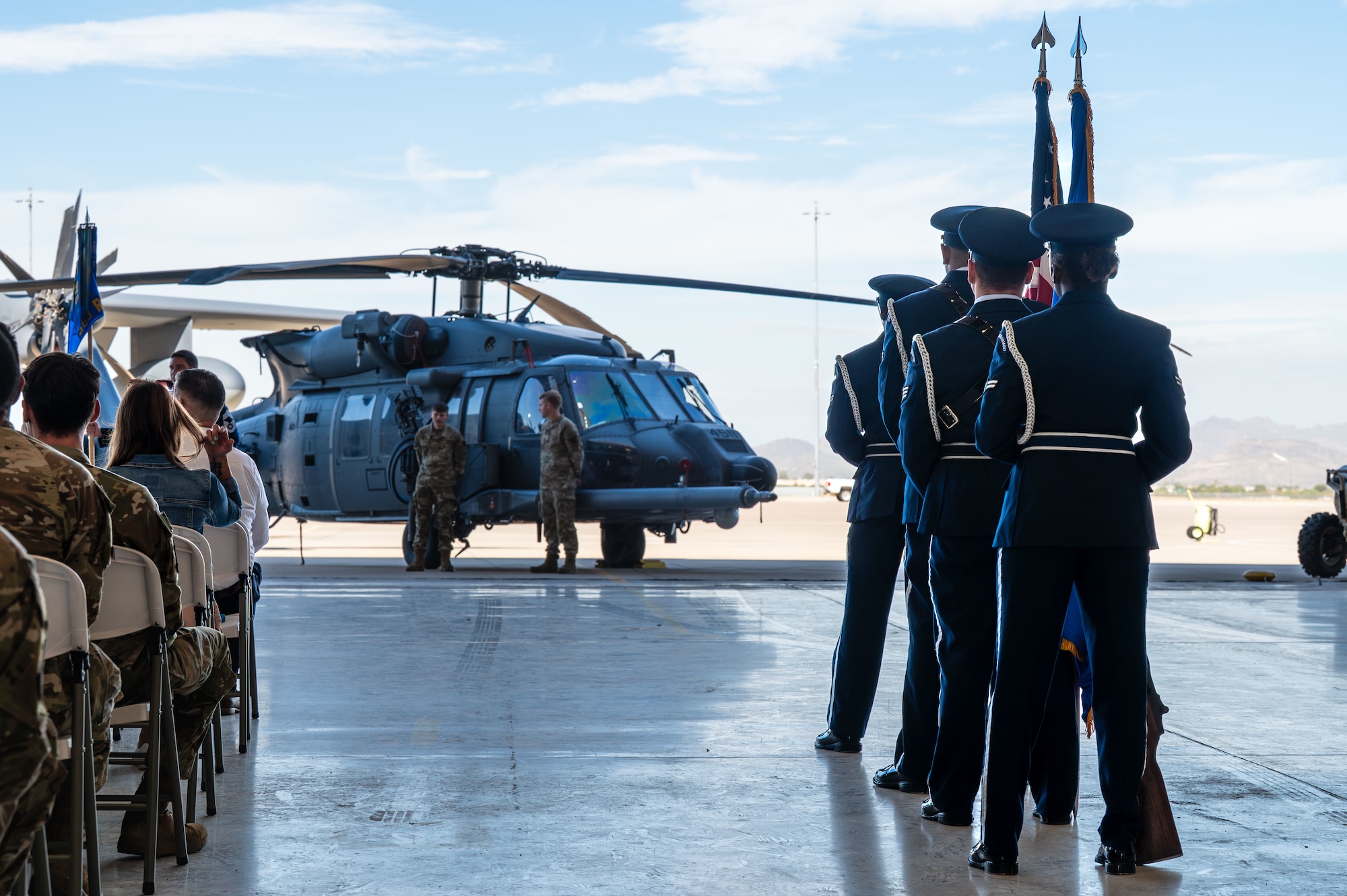 U.S. Air Force Davis-Monthan Honor Guardsmen prepare to present the colors during the 563rd Rescue Group Change of Command ceremony at Davis-Monthan Air Force Base, Arizona, Aug. 28, 2025. The Honor Guard posts the colors at any military ceremony that marks an anniversary or significant event. (U.S. Air Force photo by Senior Airman Jasmyne Bridgers-Matos)