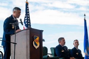 U.S. Air Force Col. Jose Cabrera, 355th Wing commander, speaks during the 563rd Rescue Group Change of Command ceremony at Davis-Monthan Air Force Base, Arizona, Aug. 28, 2025. Cabrera spoke of rescue Airmen’s dedication to the mission to always bring service members and civilians home. (U.S. Air Force photo by Senior Airman Jasmyne Bridgers-Matos)