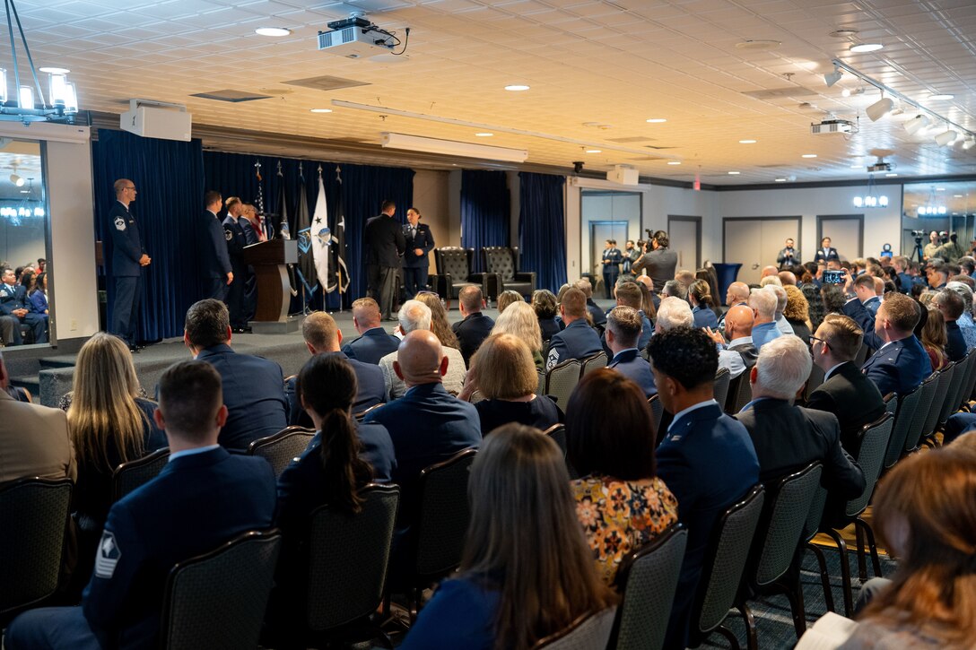 OTC graduation with Guardians in uniform. Photos feature pinning ceremony and officers in their formal blues.