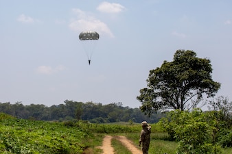 A U.S. Army paratrooper assigned to the 1st Special Forces Group (Airborne) jumps with an MC-6 parachute from a C-130 aircraft into Baturaja, Indonesia, during Super Garuda Shield 25, Aug. 27, 2025.