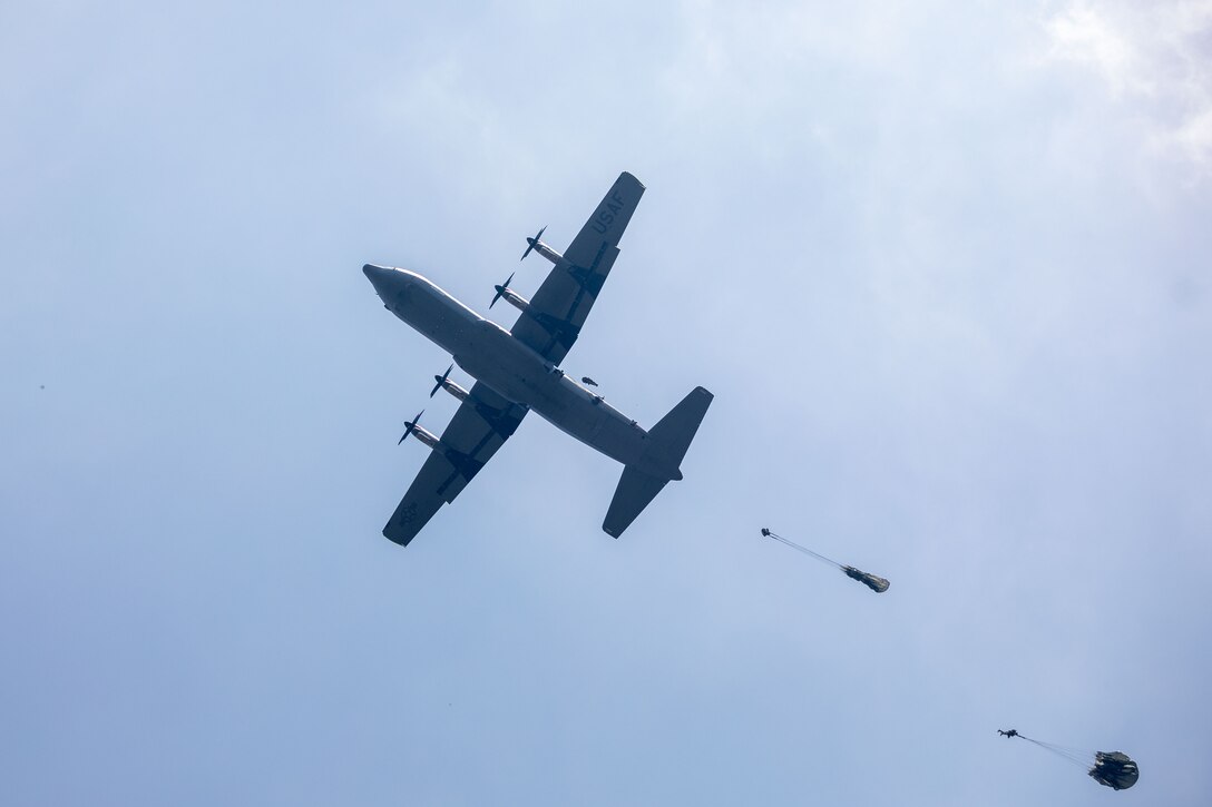 U.S. Army paratroopers assigned to the 1st Special Forces Group (Airborne) jump with MC-6 parachutes from a C-130 aircraft into Baturaja, Indonesia during Super Garuda Shield 25, Aug. 27, 2025.