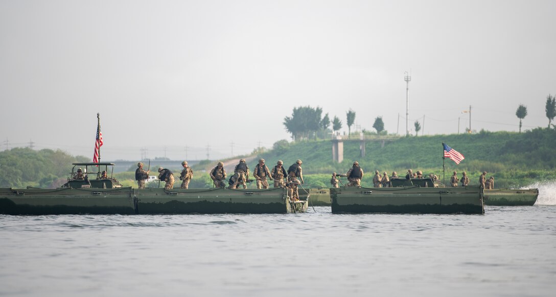 U.S. Army Soldiers assigned to the 11th Engineer Battalion, 2d Infantry Division Sustainment Brigade, 2d Infantry Division/ROK-U.S. Combined Division, assemble parts of a bridge with a bridge erecting boat during a combined wet-gap crossing training exercise as part of Ulchi Freedom Shield near Yeoju, South Korea, Aug. 27, 2025.