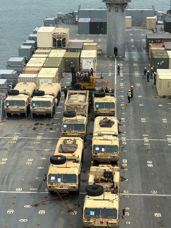 Military vehicles and equipment are prepared for an offload off Military Sealift Command chartered Motor Vessel Cape Hudson (T-AKR 5066) at the port of Bandar Lampung, Indonesia in support of exercise Super Garuda Shield 2025, Aug. 13.