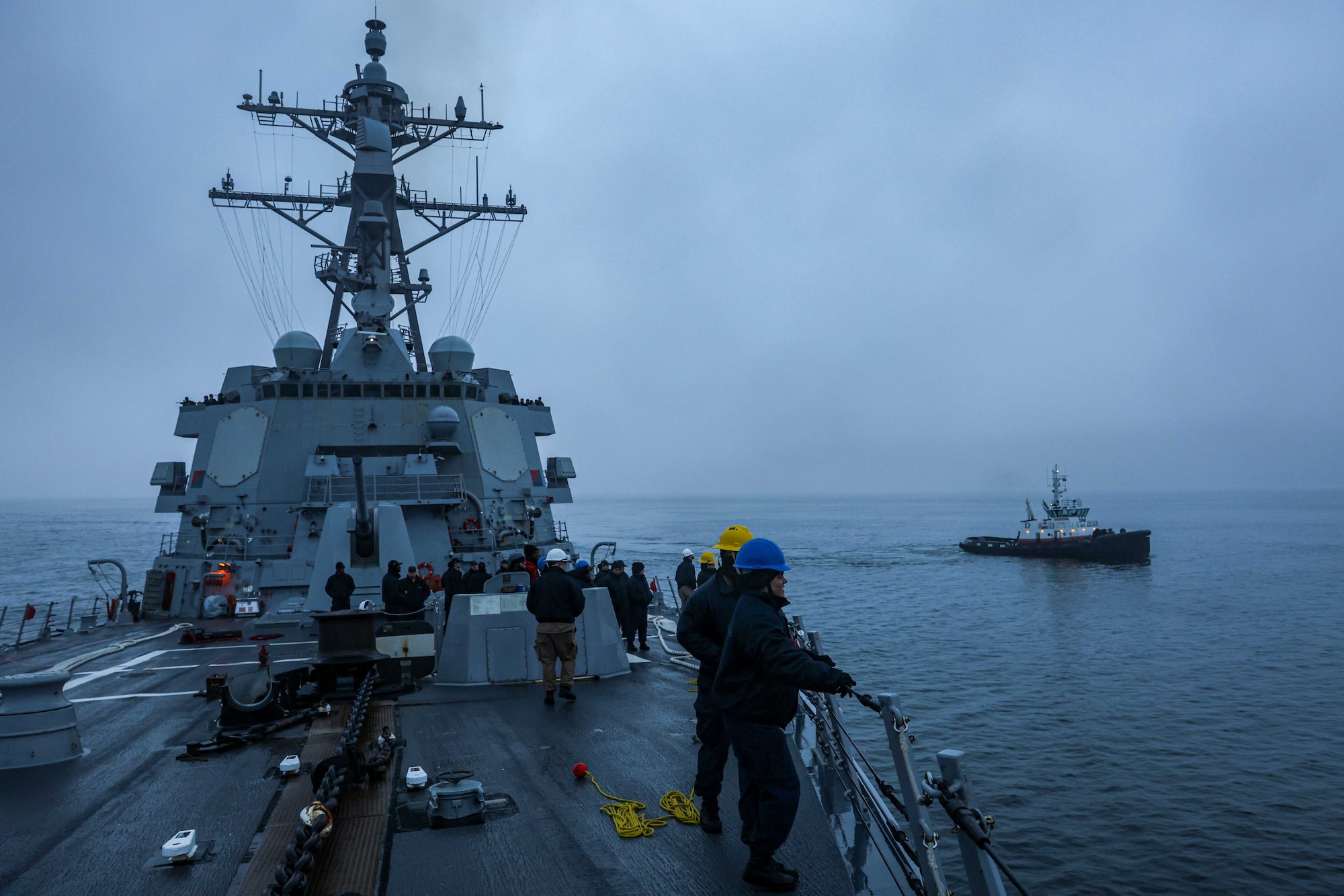 250818-N-CK999-1034 DUTCH HARBOR, Alaska (Aug. 18, 2025) The Arleigh Burke-class guided-missile destroyer USS Frank E. Petersen Jr. (DDG 121) pulls into Dutch Harbor, Alaska during a scheduled port visit as part of exercise Northern Edge 2025 (NE25). NE25 is an exercise led by U.S. Indo-Pacific Command that serves as a platform for joint, multi-domain operations to deliver high-end, realistic warfighter training strengthen joint interoperability, and sharpen the air and sea-based combat readiness of U.S. and participating forces. (U.S. Navy photo by Mass Communication Specialist 3rd Class Christian Kibler)