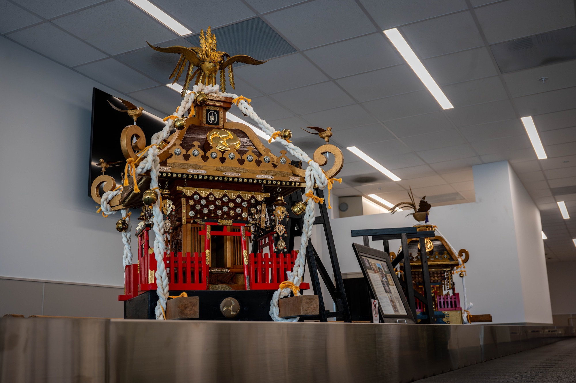 Mikoshi shrines are displayed.