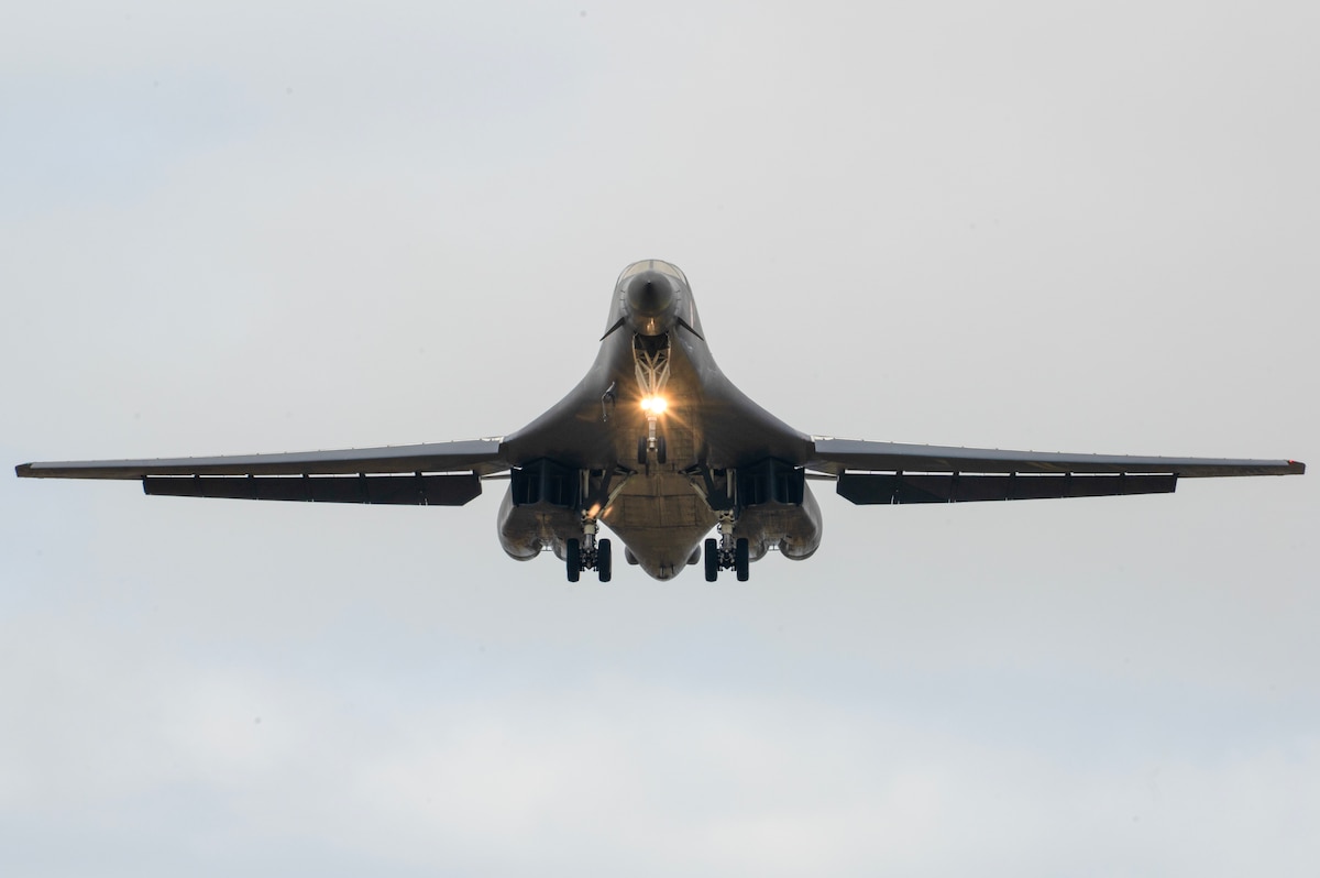 A U.S. Air Force B-1B Lancer assigned to the 345th Expeditionary Bomb Squadron, descends for landing at Ørland Air Base, Norway, during a Bomber Task Force Europe deployment, Aug. 9, 2025. The BTF mission highlights how the Air Force delivers effects rapidly across dynamic and contested environments through integrated training. (U.S. Air Force photo by Tambri Cason)