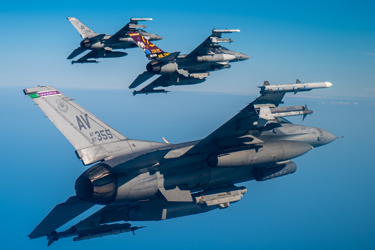 Three U.S. Air Force F-16 Fighting Falcons from the 31st Fighter Wing fly in formation over Italy, Aug. 18, 2025, during Exercise Combined Strike 25. The exercise provides realistic training scenarios, improving combat readiness and demonstrating commitment to NATO allies. (U.S. Air Force photo by Senior Airman Zachary Jakel)