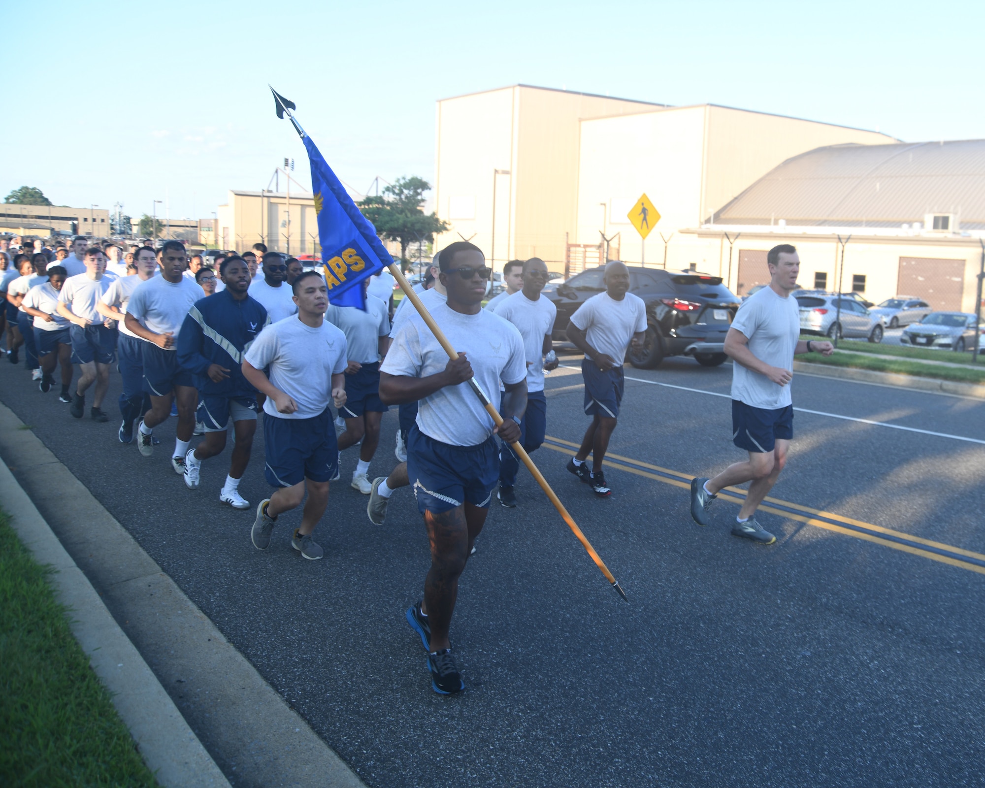 Airmen from the 69th Aerial Port Squadron, 'Port Dawgs,' and 459th Force Support Squadron, took part in the annual Port Dawg Memorial Run. The concept for the run began at Kadena Air Base, Japan, in 2013, to honor Air Transportation Airmen who lost their lives over the previous year. (U.S. Air Force photo by Lt. Col. Timothy Smith)