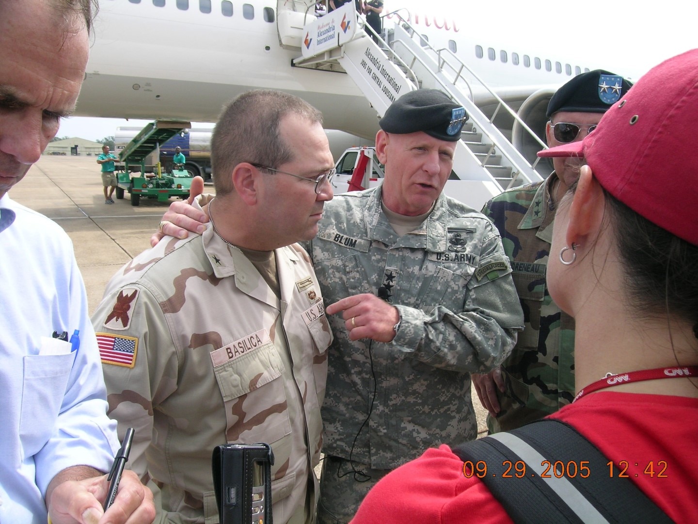 Lt. Gen. H. Steven Blum, chief of the National Guard Bureau, Maj. Gen. Russel Honore, Task Force Katrina commander, and Brig. Gen. John Basilica, 256th Infantry Brigade Combat Team commander, talk to news media during the aftermath of Hurricane Rita on Sep. 29, 2005.