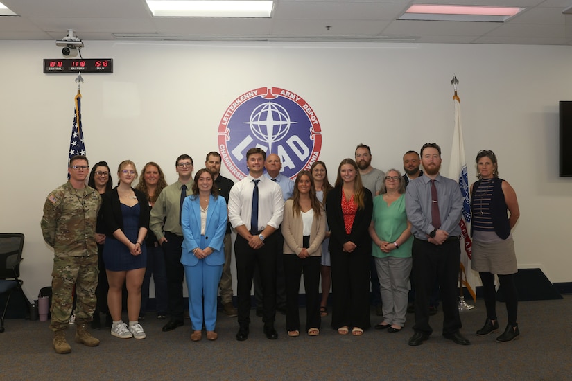 LEAD interns and one co-op student stand with Depot leadership.