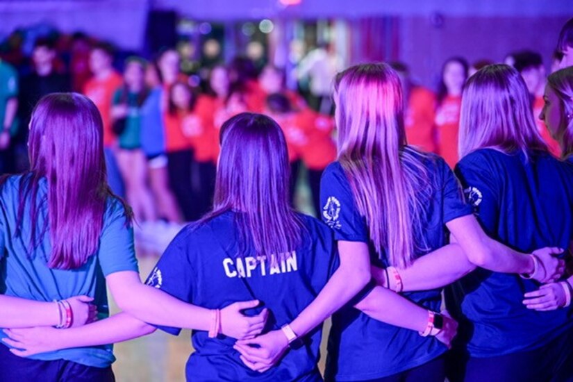 Students, part of the Creating Hope And Making Progress program, gather around for a CHAMP event at Huntingdon High School on Feb. 28, 2025.