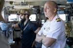 CHENNAI, India (Aug. 24, 2025) – Capt. Mike Thompson, commanding officer of the forward-deployed submarine tender USS Frank Cable (AS 40), observes the ship’s arrival to Chennai, India for a port visit, Aug. 24, 2025. Frank Cable is underway supporting the U.S. 7th Fleet, the U.S. Navy’s largest forward deployed numbered fleet, operating with allies and partners in preserving a free and open Indo-Pacific region. (U.S. Navy photo by Mass Communication Specialist 2nd Class Andrew McPeek)
