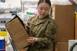 Army Reserve Pfc. Yebin Mazza, a medical logistics specialist with the Newark, Del. based 7379th Blood Detachment, moves and reorganizes medical supplies at the Alexander T. Augusta Military Medical Center located at Fort Belvoir, Va., Aug. 21, 2025. Mazza and an estimated 25 Soldiers from the Army Reserve Medical Command hierarchy took part in the Medical Readiness Skills Sustainment Program for the Military, otherwise known as MRSSP-MIL, to conduct real-world medical training and support in ATAMMC, the Walter Reed Army Institute of Research in Silver Spring, Md., and the DiLorenzo Pentagon Health Clinic at the Pentagon in Washington, D.C.; from Aug. 3, 2025, through Aug. 30, 2025.  (U.S. Army Reserve photo by Sgt. 1st Class Christopher Hernandez)