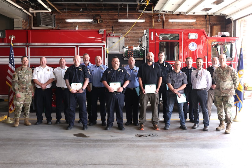 Letterkenny Army Depot leadership stands with Letterkenny Army Depot firefighters and environmental personnel after an awards ceremony on May 7.
