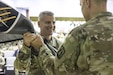 (Left to Right) U.S. Army Col. Andrew V. Walsh, incoming commander, receives the brigade colors from Maj. Gen. Jan C. Norris, commanding general, 335th Signal Command (Theater), during the Army Reserve Cyber Protection Brigade, combined change of command and change of responsibility ceremony, at the Adelphi Laboratory Center, Adelphi, Maryland, August 23, 2025. Soldiers from the Army cyber and signal community gathered with family and close colleagues to celebrate the event. (U.S. Army Reserve photo by Maj. Jevon Thomas)