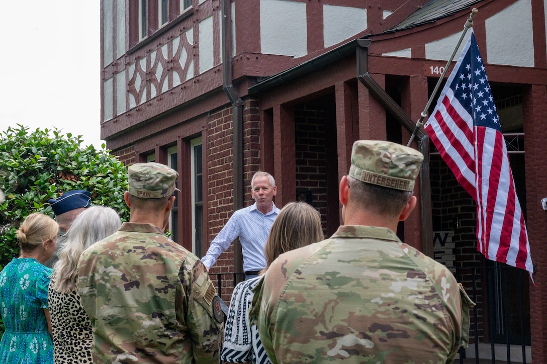 Retired U.S. Air Force Maj. Gen. John McMullen speaks during the McMullen House dedication