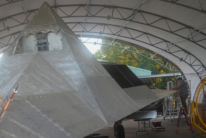 Employee riveting F-117 Blackhawk