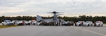 U.S. Marines and civilians from Marine Corps Air Station (MCAS) New River and Marine Medium Tiltrotor Squadron (VMM) 365 pose for a photo with first responders from neighboring communities after an aircraft mishap exercise at Marine Corps Outlying Landing Field Camp Davis on Marine Corps Base Camp Lejeune, North Carolina, Aug. 28, 2025.