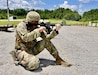 U.S. Army Sgt. Maj. Jason Rhodes, of the 38th Infantry Division Artillery, competes in the Rifle Excellence-in-Competition match during The Adjutant General's Match at Wendell H. Ford Regional Training Center, July 11-13.