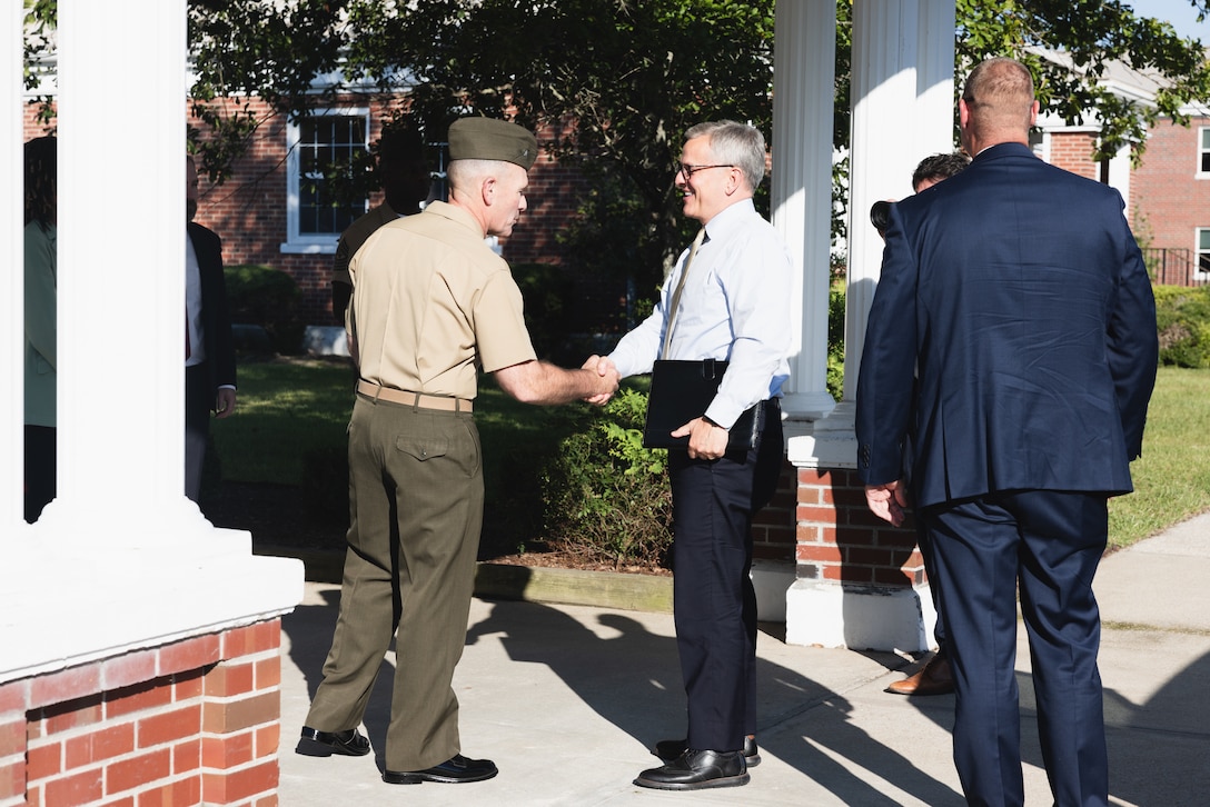 U.S. Marine Corps Brig. Gen. Ralph J. Rizzo, Jr., commanding general, Marine Corps Installations East-Marine Corps Base (MCB) Camp Lejeune shakes hands with North Carolina Governor Josh Stein during his first official visit to MCB Camp Lejeune, North Carolina, Aug. 29, 2025.