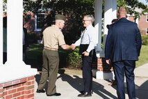 U.S. Marine Corps Brig. Gen. Ralph J. Rizzo, Jr., commanding general, Marine Corps Installations East-Marine Corps Base (MCB) Camp Lejeune shakes hands with North Carolina Governor Josh Stein during his first official visit to MCB Camp Lejeune, North Carolina, Aug. 29, 2025.