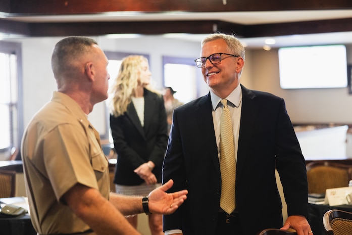 U.S. Marine Corps Brig. Gen. Ralph J. Rizzo, Jr., commanding general, Marine Corps Installations East-Marine Corps Base (MCB) Camp Lejeune speaks with North Carolina Governor Josh Stein during his first official visit to MCB Camp Lejeune, North Carolina, Aug. 29, 2025.