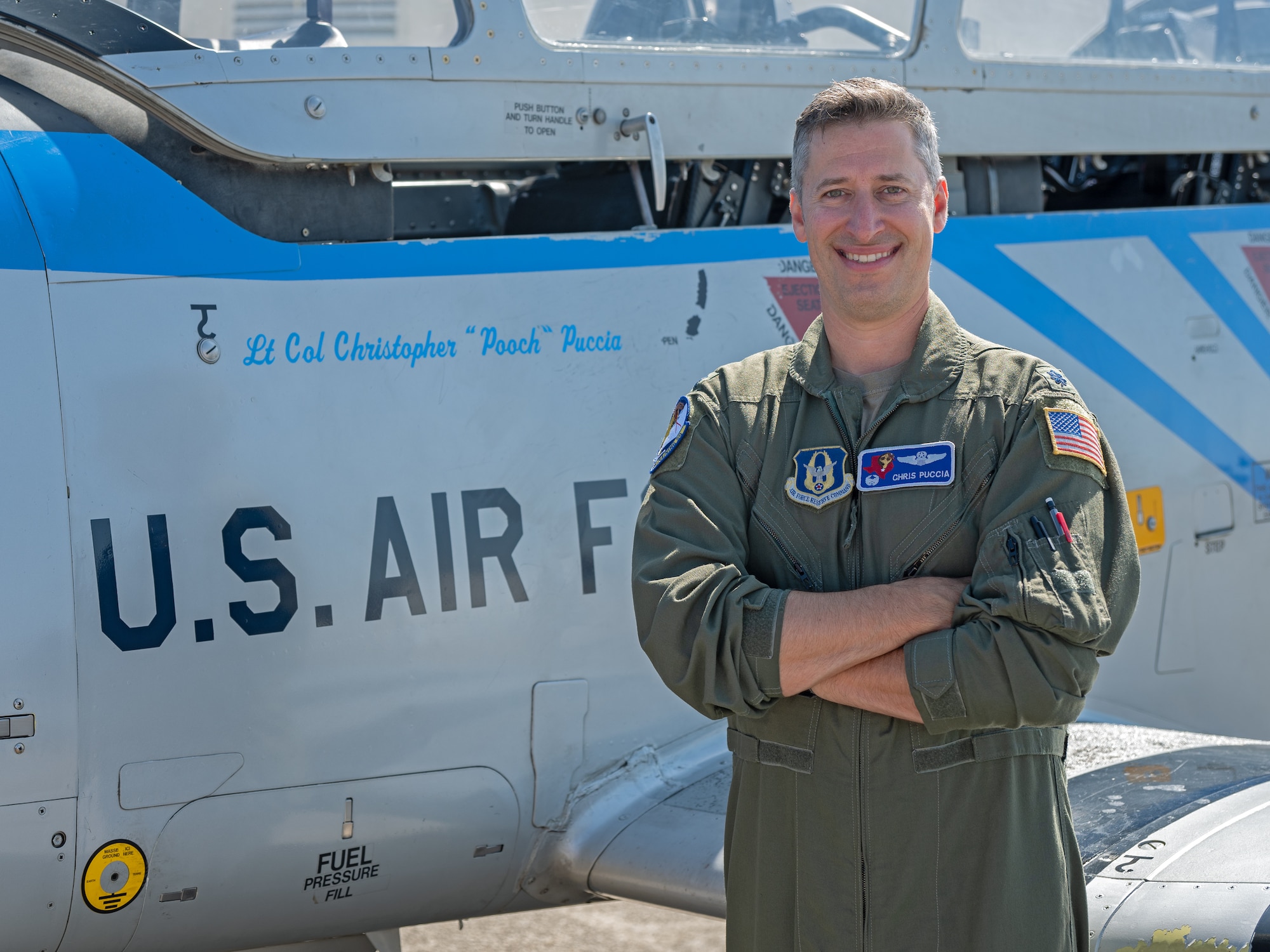 Puccia poses for photo in front of 39th FTS Cobras flagship T-6A Texan II