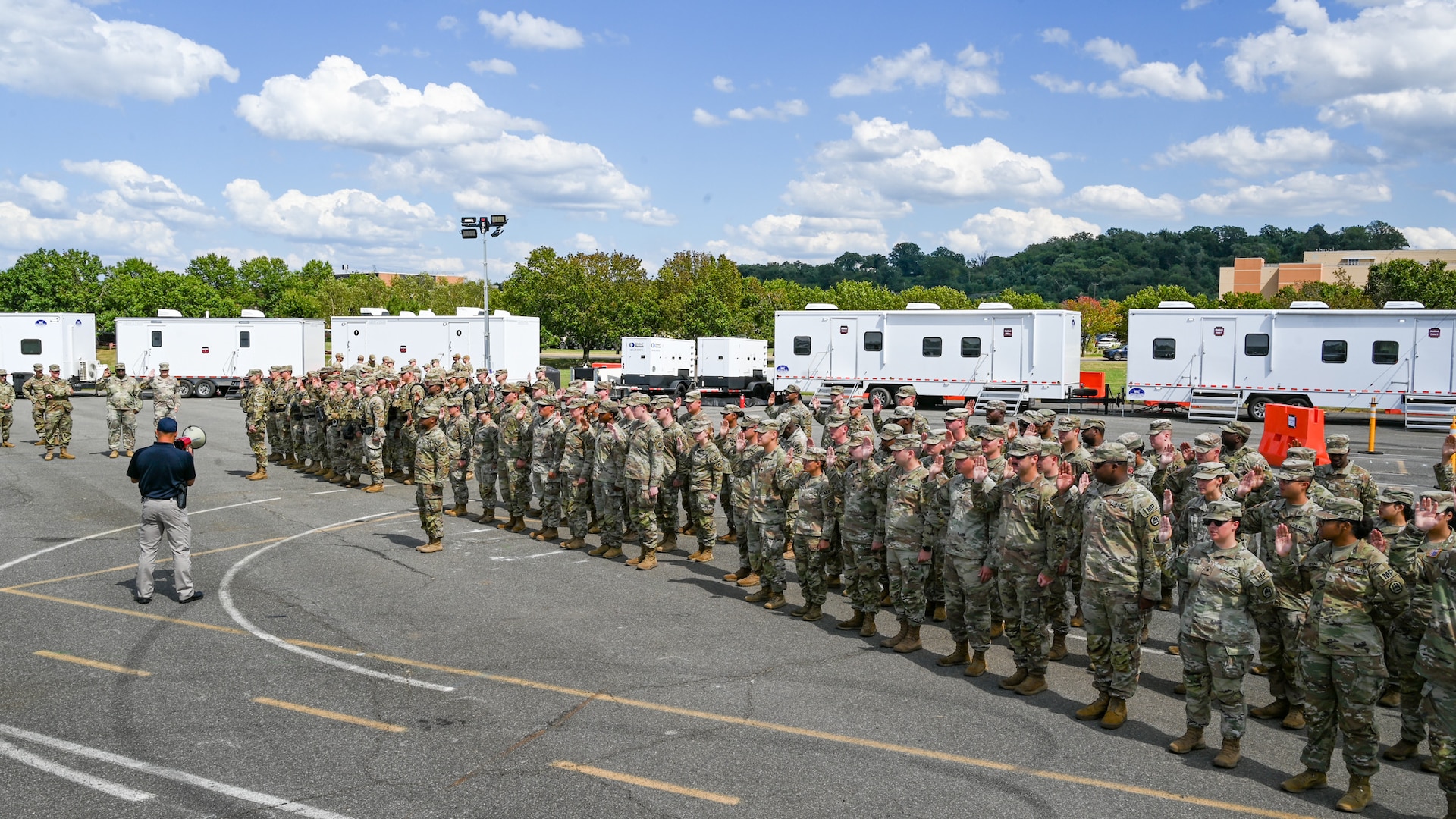 U.S. Soldiers with the Louisiana National Guard recite the oath to become deputized in support of law enforcement partners as part of the Joint Task Force – District of Columbia on Joint Base Anacostia-Bolling Aug. 25 2025. About 2,000 National Guard members are supporting the D.C. Safe and Beautiful mission Task Force providing critical support to the D.C. Metropolitan Police Department in ensuring the safety of all who live, work and visit the District.