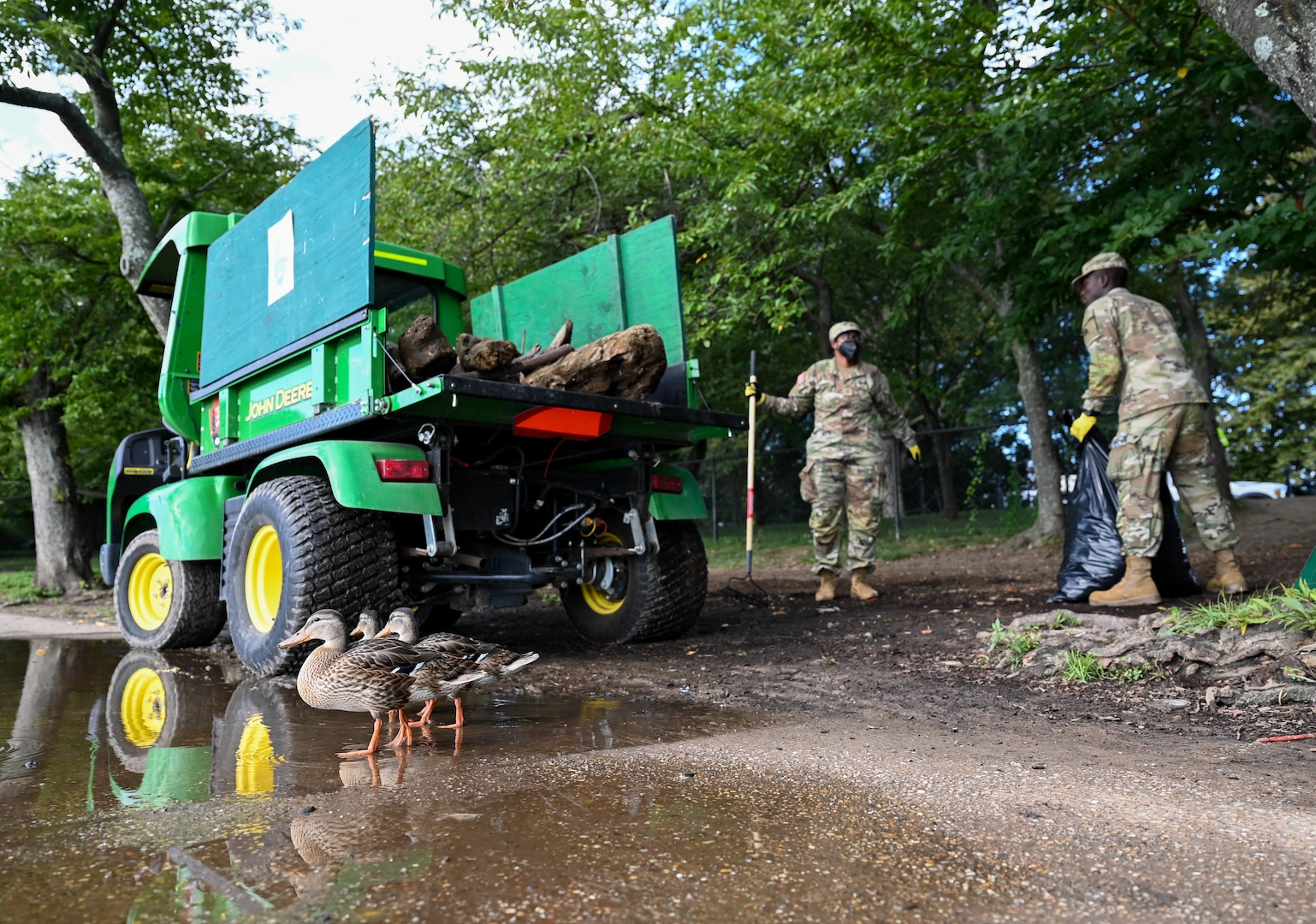 U.S. Soldiers with the District of Columbia Army National Guard assigned to Task Force Beautification clean up trash and debris along the shoreline of the Tidal Basin near the Martin Luther King Jr. Memorial in Washington, D.C., Aug. 25, 2025. About 2,000 National Guard members are supporting the D.C. Safe and Beautiful mission, providing critical support to the D.C. Metropolitan Police Department in ensuring the safety of all who live, work and visit the District.