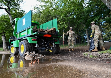 U.S. Soldiers with the District of Columbia Army National Guard assigned to Task Force Beautification clean up trash and debris along the shoreline of the Tidal Basin near the Martin Luther King Jr. Memorial in Washington, D.C., Aug. 25, 2025. About 2,000 National Guard members are supporting the D.C. Safe and Beautiful mission, providing critical support to the D.C. Metropolitan Police Department in ensuring the safety of all who live, work and visit the District.