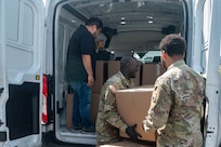 U.S Soldiers of the Army National Guard prepare and distribute food for distribution at Joint Base Anacostia-Bolling, Aug. 29, 2025. Food is issued to about 2,300 National Guard members that are supporting the D.C. Safe and Beautiful mission providing critical support to the D.C. Metropolitan Police Department in ensuring the safety of all who live, work, and visit the District.