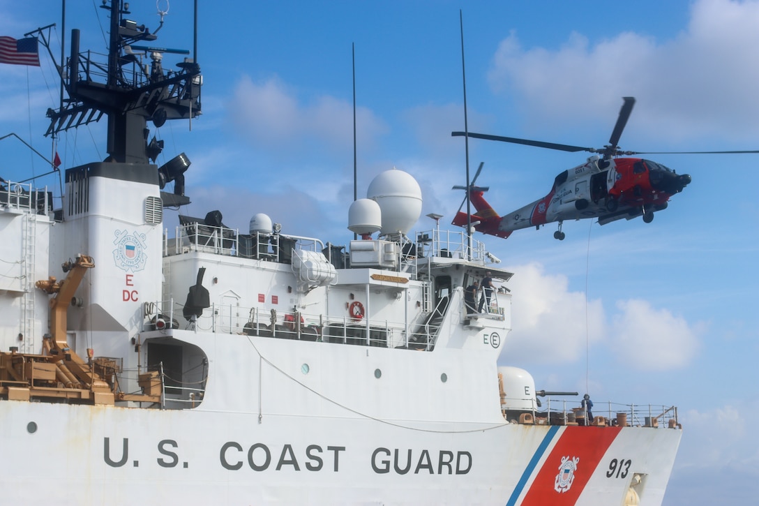 Coast Guard Cutter Mohawk (WMEC 913) and a Coast Guard MH-60 Jayhawk helicopter air crew conduct flight training evolutions in the Caribbean Sea, July 15, 2025. Mohawk’s crew conducted a 75-day maritime border security patrol in the Caribbean Sea, Florida Straits and Caribbean Sea. (U.S. Coast Guard photo by Seaman Corrie Gill)
