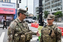U.S. Army Col. Lawrence Doane, DC Safe and Beautiful Taskforce Commander, engages with U.S. Service Members assigned to JTF-DC and Civilians at Nationals Park in Washington D.C., August 19, 2025. Approximately 800 National Guard service members comprise JTF-DC to support the DC Safe and Beautiful Taskforce. These National Guard service members provide critical support such as crowd management, perimeter control, logistics and communications in support of law enforcement. A majority of the D.C. National Guard personnel live and work in the local community and have existing relationships to support law enforcement.