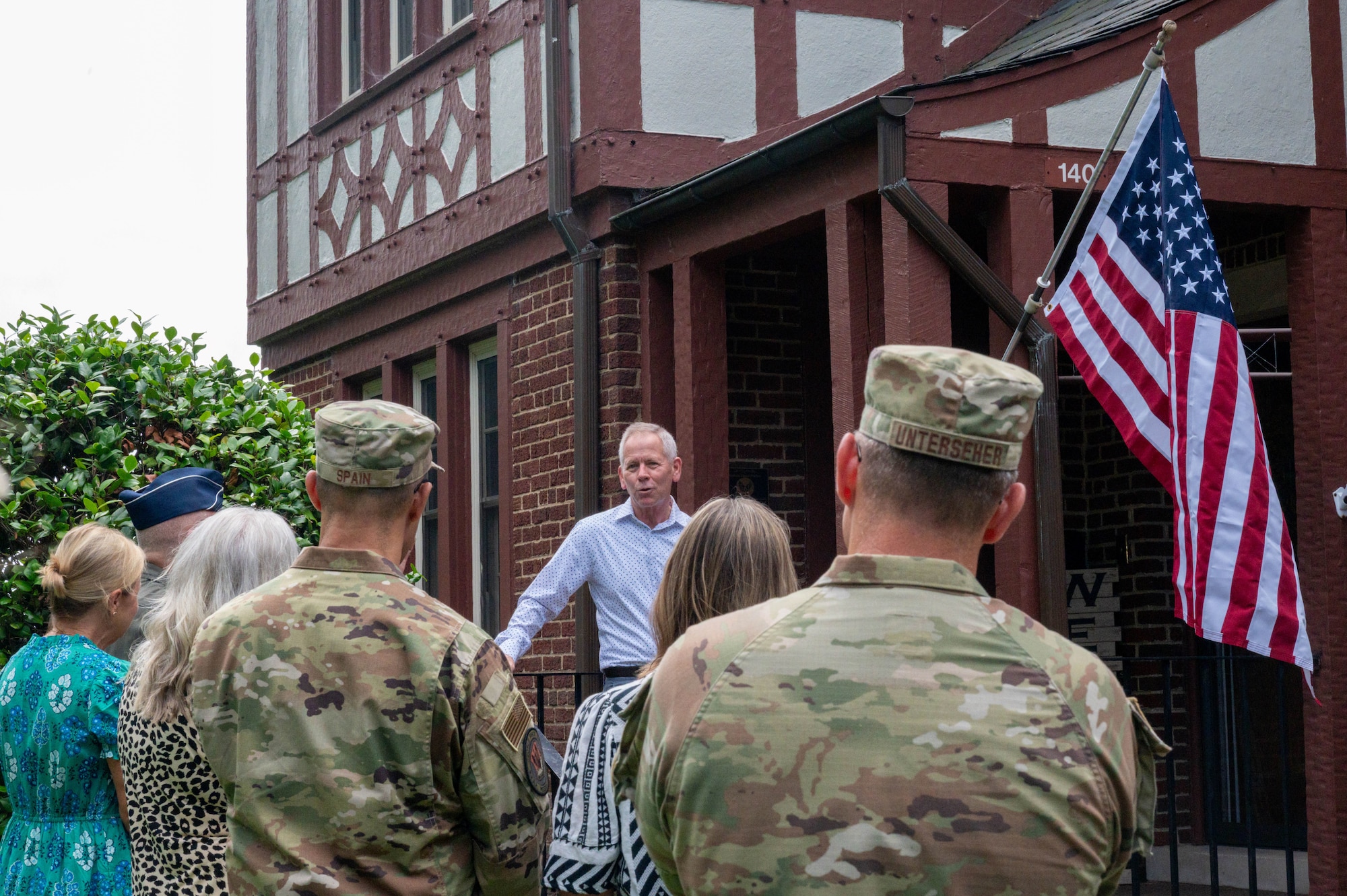 Retired U.S. Air Force Maj. Gen. John McMullen speaks during the McMullen House dedication
