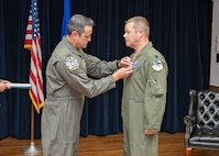 340th FTG commander presents Meritorious Service Medal to former 39th FTS commander