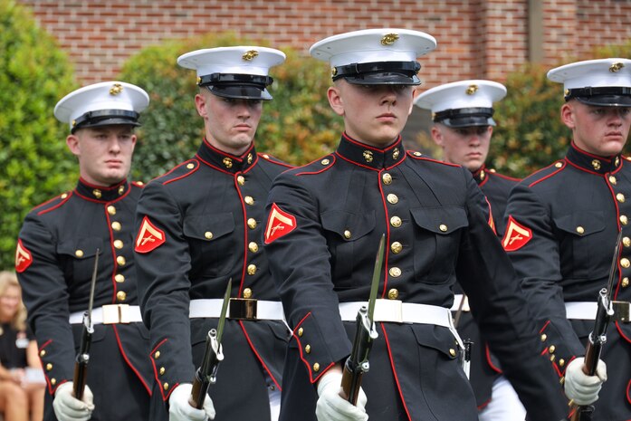 U.S. Marines with the United States Marine Corps Silent Drill Platoon execute their opening sequence for students and civilians attending a performance at Greater Atlanta Christian High School during Marine Week Atlanta in Norcross, Ga., Aug. 28, 2025. The year 2025 marks the 250th anniversary of the United States Marine Corps, a milestone that highlights the legacy, transformation and enduring spirit of the Corps since 1775. Throughout the year, Marines across the globe will commemorate this anniversary by honoring the service and sacrifice of those who served before them and by remaining faithful to the motto Semper Fidelis. (U.S. Marine Corps photo by Cpl. Christopher Prelle)
