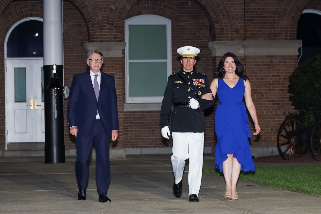 From left, His Excellency Lord Peter Mandelson, guest of honor and British ambassador to the United States, Lt. Gen. Benjamin Watson, hosting official and commanding general of Training and Education Command, and his wife enter the Evening Parade at Marine Barracks Washington, D.C., Aug. 22, 2025. Evening Parades, held every Friday during the summer, feature the U.S. Marine Corps Silent Drill Platoon, “The President’s Own” U.S. Marine Band, “The Commandant’s Own” U.S. Marine Drum and Bugle Corps, and the official Marine Corps Color Guard, showcasing the precision, discipline and 250 years of tradition that define the Corps. (U.S. Marine Corps photo by Cpl. Christopher Prelle)