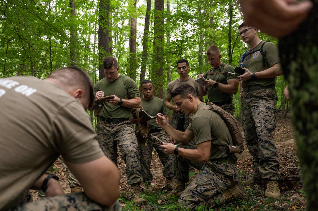 U.S. Marine Corps Capt. Blaine Mainz, a student assigned to Expeditionary Warfare School, Marine Corps University, briefs a tactical decision duringLeadership Decision Making Exercise I at Marine Corps Base Quantico, Virginia, Aug. 22, 2025. Students at EWS participated in decision-forcing cases based on the Battle of Belleau Wood combined with physical training exercises to increase problem-solving skills under pressure. Mainz is a native of Virginia. (U.S. Marine Corps photo by Capt. Colton Martin)