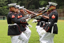 U.S. Marines with the United States Marine Corps Silent Drill Platoon execute their opening sequence during a performance for the students of Cross Keys High School during Marine Week Atlanta in Brookhaven, Ga., Aug. 28, 2025. The year 2025 marks the 250th anniversary of the United States Marine Corps, a milestone that highlights the legacy, transformation and enduring spirit of the Corps since 1775. Throughout the year, Marines across the globe will commemorate this anniversary by honoring the service and sacrifice of those who served before them and by remaining faithful to the motto Semper Fidelis. (U.S. Marine Corps photo by Cpl. Christopher Prelle)