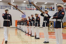 U.S. Marines with the United States Marine Corps Silent Drill Platoon execute their "long line" sequence during a performance for the students of Parkview High School during Marine Week Atlanta in Lilburn, Ga., Aug. 29, 2025. The year 2025 marks the 250th anniversary of the United States Marine Corps, a milestone that highlights the legacy, transformation and enduring spirit of the Corps since 1775. Throughout the year, Marines across the globe will commemorate this anniversary by honoring the service and sacrifice of those who served before them and by remaining faithful to the motto Semper Fidelis. (U.S. Marine Corps photo by Cpl. Christopher Prelle)