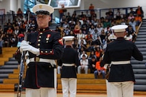 U.S. Marines with the United States Marine Corps Silent Drill Platoon execute their "long line" sequence during a performance for the students of Parkview High School during Marine Week Atlanta in Lilburn, Ga., Aug. 29, 2025. The year 2025 marks the 250th anniversary of the United States Marine Corps, a milestone that highlights the legacy, transformation and enduring spirit of the Corps since 1775. Throughout the year, Marines across the globe will commemorate this anniversary by honoring the service and sacrifice of those who served before them and by remaining faithful to the motto Semper Fidelis. (U.S. Marine Corps photo by Cpl. Christopher Prelle)