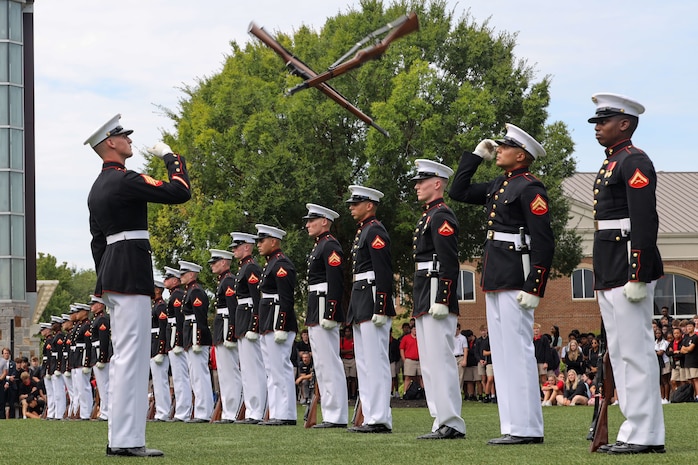 U.S. Marines with the United States Marine Corps Silent Drill Platoon execute their "long line" sequence during a performance for the students of Greater Atlanta Christian High School during Marine Week Atlanta in Norcross, Ga., Aug. 28, 2025. The year 2025 marks the 250th anniversary of the United States Marine Corps, a milestone that highlights the legacy, transformation and enduring spirit of the Corps since 1775. Throughout the year, Marines across the globe will commemorate this anniversary by honoring the service and sacrifice of those who served before them and by remaining faithful to the motto Semper Fidelis. (U.S. Marine Corps photo by Cpl. Christopher Prelle)